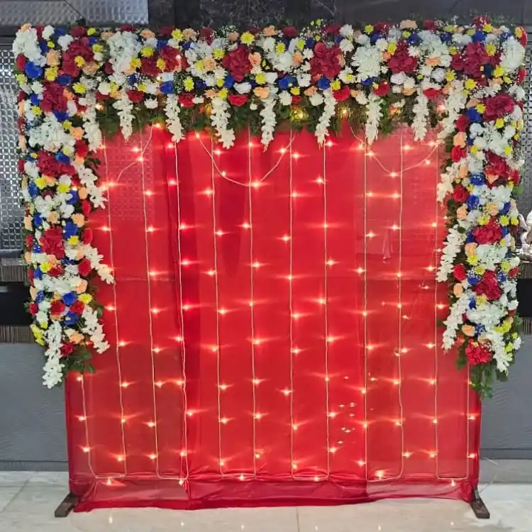 Ganpati festival mandap décor with Lights and floral elements